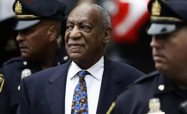 FILE - Bill Cosby arrives for his sentencing hearing at the Montgomery County Courthouse, Sept. 24, 2018, in Norristown, Pa. (AP Photo/Matt Slocum, File)