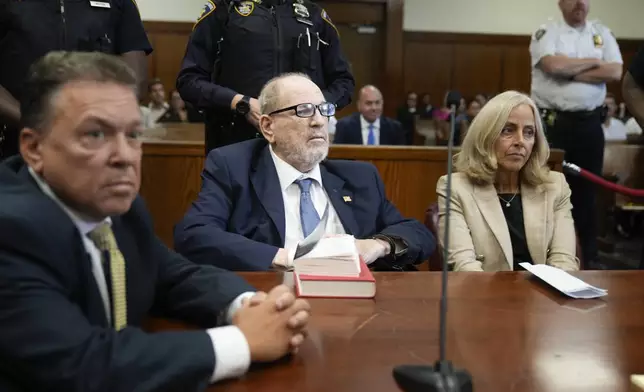 Harvey Weinstein, center, appears in criminal court in New York, Wednesday, Sept. 18, 2024. (AP Photo/Seth Wenig, Pool)