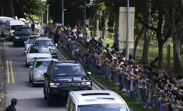 Pope Francis and entourage leave St Theresa's Home in Singapore, Friday, Sept. 13, 2024. (AP Photo/Suhaimi Abdullah)