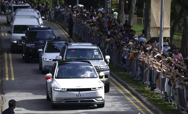 Pope Francis and entourage leave St Theresa's Home in Singapore, Friday, Sept. 13, 2024. (AP Photo/Suhaimi Abdullah)