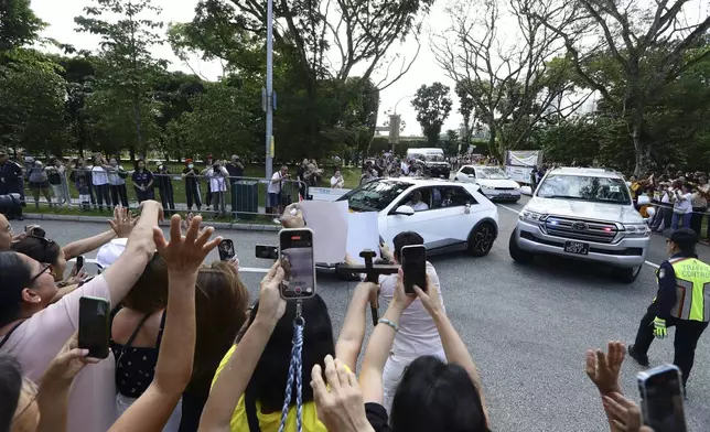 Pope Francis and entourage arrive at St Theresa's Home in Singapore, Friday, Sept. 13, 2024. (AP Photo/Suhaimi Abdullah)