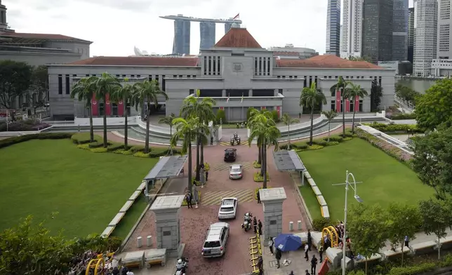 Motorcade of Pope Francis arrive at the Parliament House in Singapore, Thursday, Sept. 12, 2024. (AP Photo/Vincent Thian)