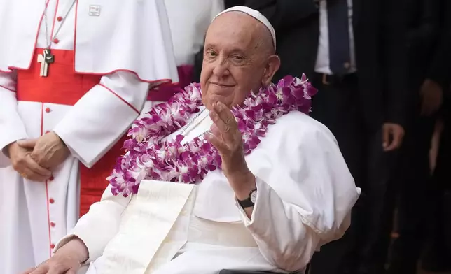 Pope Francis attends an interreligious meeting with young people at the Catholic Junior College in Singapore, Friday, Sept. 13, 2024. Pope Francis is wrapping up his visit to Singapore by praising its tradition of interfaith harmony. (AP Photo/Gregorio Borgia)