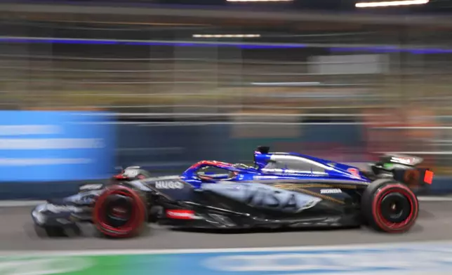 RB driver Daniel Ricciardo of Australia during the second practice session of the Singapore Formula One Grand Prix at the Marina Bay Street Circuit, in Singapore, Friday, Sept. 20, 2024. (AP Photo/Vincent Thian)