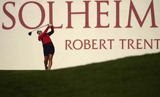 United States' Lauren Coughlin hits from the first tee during a practice round prior to the Solheim Cup golf tournament at the Robert Trent Jones Golf Club, Wednesday, Sept. 11, 2024, in Gainesville, VA. (AP Photo/Matt York)