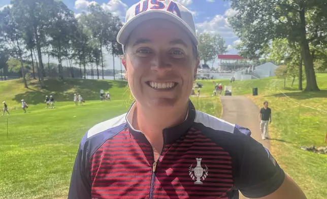 Lauren Coughlin poses for a photo near the first hole at Robert Trent Jones Golf Club in Gainesville, Va., on Wednesday, Sept. 11, 2024. (AP Photo/Ben Nuckols)