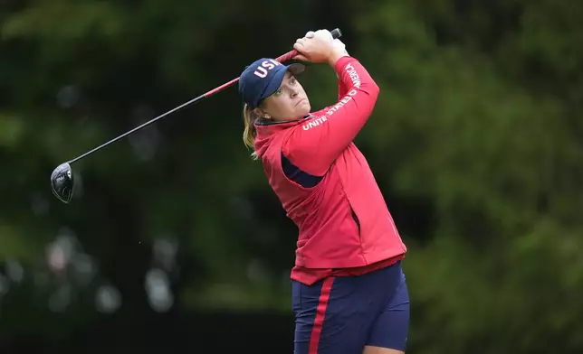 United States' Lauren Coughlin hits from the third tee during a Solheim Cup golf tournament foursomes match at Robert Trent Jones Golf Club, Friday, Sept. 13, 2024, in Gainesville, Va. (AP Photo/Chris Szagola)