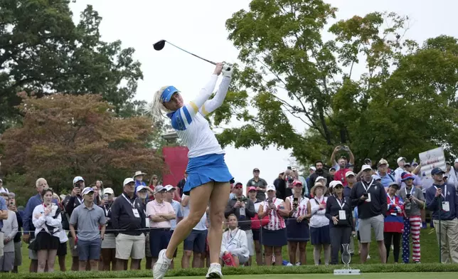 Europe's Charley Hull hits from the eighth tee during a Solheim Cup golf tournament foursomes match at Robert Trent Jones Golf Club, Friday, Sept. 13, 2024, in Gainesville, VA. (AP Photo/Matt York)