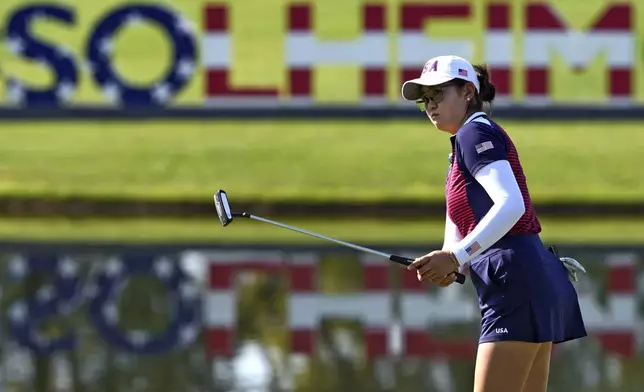 United States' Rose Zhang hits on the fourth green during a practice round prior to the Solheim Cup golf tournament at the Robert Trent Jones Golf Club, Wednesday, Sept. 11, 2024, in Gainesville, VA. (AP Photo/Matt York)