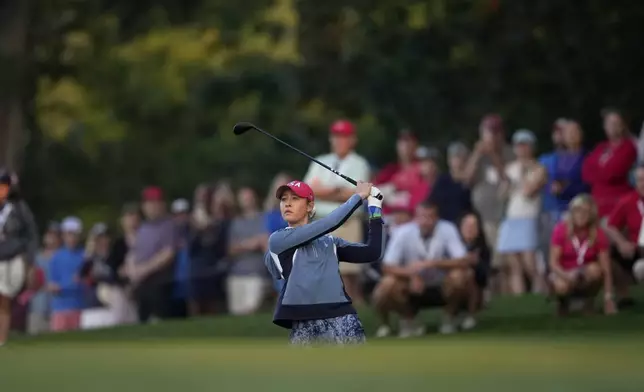 United States' Nelly Korda hits from the first fairway during a Solheim Cup golf tournament foursome match at Robert Trent Jones Golf Club, Saturday, Sept. 14, 2024, in Gainesville, Va. (AP Photo/Matt York)