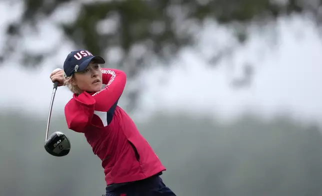 United States' Nelly Korda hits from the second tee during a Solheim Cup golf tournament foursomes match at Robert Trent Jones Golf Club, Friday, Sept. 13, 2024, in Gainesville, VA. (AP Photo/Matt York)