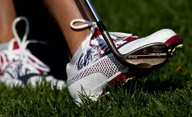 United States' Lexi Thompson wears shoes with her likeness on them during a practice round prior to the Solheim Cup golf tournament at the Robert Trent Jones Golf Club, Wednesday, Sept. 11, 2024, in Gainesville, VA. (AP Photo/Matt York)