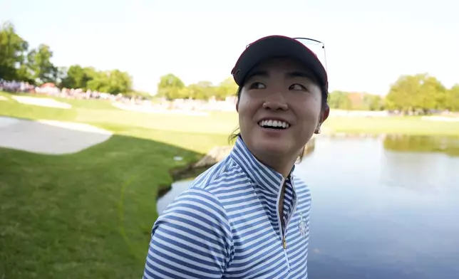 United States' Rose Zhang smiles after winning a fourball match on the 14th hole during a Solheim Cup golf tournament at Robert Trent Jones Golf Club, Saturday, Sept. 14, 2024, in Gainesville, Va. (AP Photo/Chris Szagola)