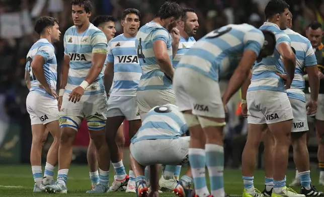 Argentina players react after losing against South Africa at the end of a rugby championship test match at Mbombela stadium in Nelspruit, South Africa, Saturday, Sept. 28, 2024. (AP Photo/Themba Hadebe)