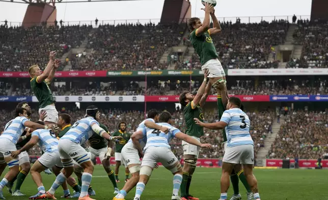 South Africa's Eben Etzebeth catches the ball during a rugby championship test match against Argentina at Mbombela stadium in Nelspruit, South Africa, Saturday, Sept. 28, 2024. (AP Photo/Themba Hadebe)