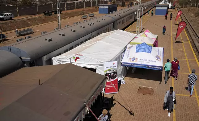 The Phelophepa train, is stationed at a station in Tembisa, east of Johannesburg, South Africa, Thursday, Aug. 22, 2024. (AP Photo/Themba Hadebe)