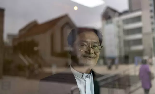 Rev. Chung Joon-hee, a pastor at Youngnak Presbyterian Church, stands for a portrait in Seoul, Sunday, May 26, 2024. (AP Photo/Jae C. Hong)