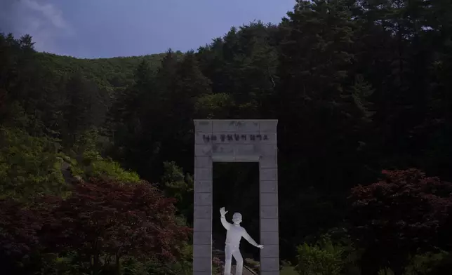 A statue of Lee Seung-bok, a 9-year-old boy who was killed in 1968 by North Korean infiltrators, is accompanied by an inscription that reads, "I hate communists," at the Lee Seung-bok Memorial Hall in Pyeongchang, South Korea, Wednesday, May 22, 2024. (AP Photo/Jae C. Hong)