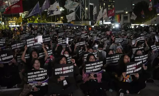 Feminist activists stage a rally against illegal deepfake content calling for the government to enact appropriate countermeasures in Seoul, South Korea, Friday, Sept. 6, 2024. The banners read "Regulate internet platforms that encourage deepfake sexual crimes." (AP Photo/Ahn Young-joon)