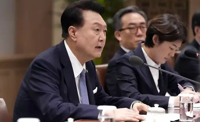 South Korean President Yoon Suk Yeol meets Japanese Prime Minister Fumio Kishida during a meeting at the Presidential Office in Seoul, South Korea, Friday, Sept. 6, 2024. (AP Photo/Lee Jin-man, Pool)