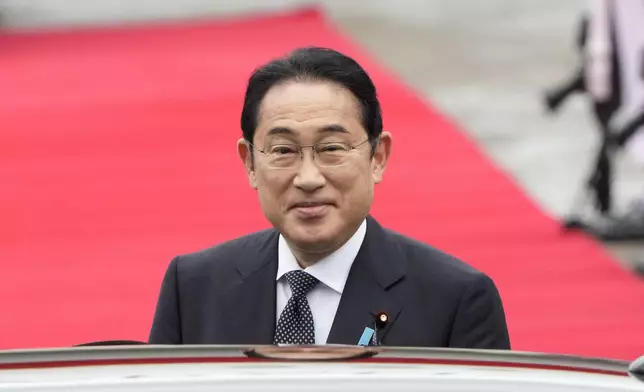 Japanese Prime Minister Fumio Kishida stands to get into a car upon his arrival at Seoul air base in Seongnam, South Korea, Friday, Sept. 6, 2024. (AP Photo/Ahn Young-joon)