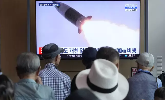 A TV screen shows a file image of North Korea's missile launch during a news program at Seoul Railway Station in Seoul, South Korea, Wednesday, Sept. 18, 2024. (AP Photo/Ahn Young-joon)