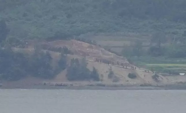 North Korean, along the military fences, are seen from South Korea's Paju Thursday, Sept. 5, 2024. (AP Photo/Lee Jin-man)