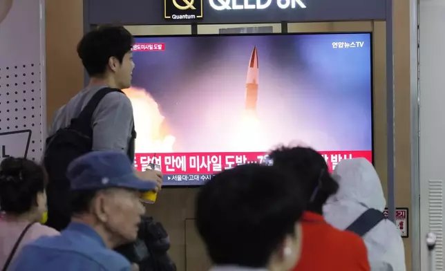 A TV screen shows a file image of North Korea's missile launch during a news program at Seoul Railway Station in Seoul, South Korea, Thursday, Sept. 12, 2024. (AP Photo/Ahn Young-joon)