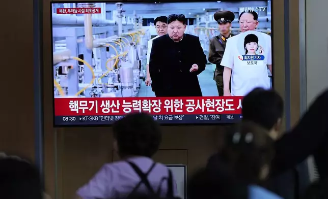 A TV screen shows an image of North Korean leader Kim Jong Un during a news program at the Seoul Railway Station in Seoul, South Korea, Friday, Sept. 13, 2024. The letters read, "North Korea, unveiling the uranium enrichment facility for the first time," and "the construction site for expanding the capacity for the production of nuclear weapons." (AP Photo/Lee Jin-man)