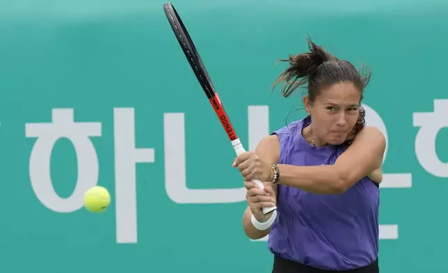 Daria Kasatkina of Russia returns a shot to Emma Raducanu of Britain during their quarterfinal match of the Korea Open tennis championships in Seoul, South Korea, Saturday, Sept. 21, 2024. (AP Photo/Ahn Young-joon)