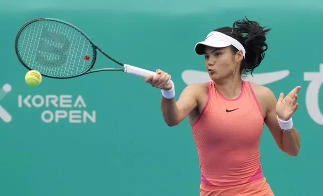 Emma Raducanu of Britain returns a shot to Daria Kasatkina of Russia during their quarterfinal match of the Korea Open tennis championships in Seoul, South Korea, Saturday, Sept. 21, 2024. (AP Photo/Ahn Young-joon)