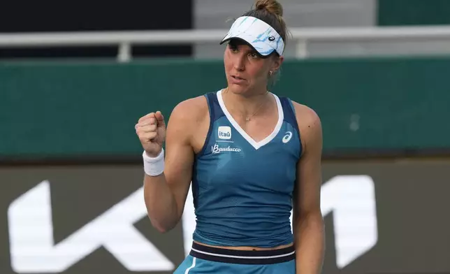 Beatriz Haddad Maia of Brazil reacts after a play against Ajla Tomljanovic of Australia during their quarterfinal match at the Korea Open tennis championships in Seoul, South Korea, Thursday, Sept. 19, 2024. (AP Photo/Ahn Young-joon)