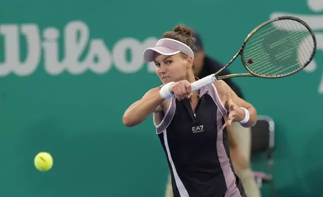 Veronika Kudermetova of Russia returns a shot to Beatriz Haddad Maia of Brazil during their semi final match of the Korea Open tennis championships in Seoul, South Korea, Saturday, Sept. 21, 2024. (AP Photo/Ahn Young-joon)