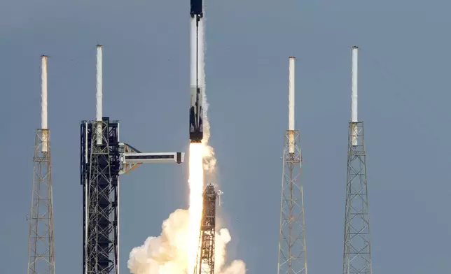 A SpaceX Falcon 9 rocket with a crew of two lifts off from launch pad 40 at the Cape Canaveral Space Force Station Saturday, Sept. 28, 2024 at Cape Canaveral, Fla. (AP Photo/John Raoux)