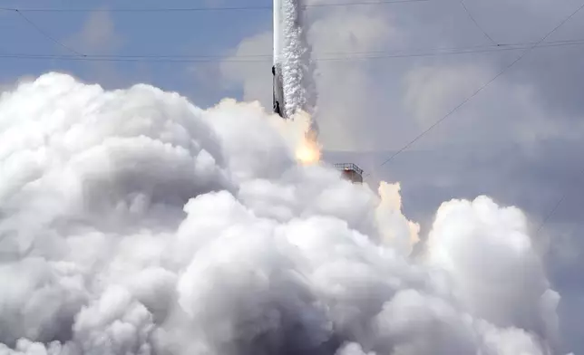 A SpaceX Falcon 9 rocket, with a crew of two astronauts, lifts off from launch pad 40 at the Cape Canaveral Space Force Station Saturday, Sept. 28, 2024, in Cape Canaveral, Fla. (AP Photo/Chris O'Meara)