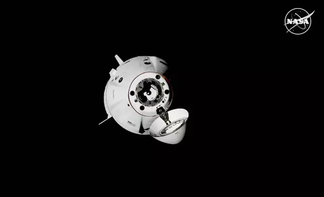 SpaceX capsule Dragon approaches the International Space Station, Sunday, Sept. 29, 2024. (NASA via AP)