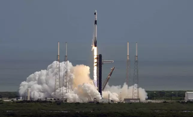 A SpaceX Falcon 9 rocket, with a crew of two astronauts, lifts off from launch pad 40 at the Cape Canaveral Space Force Station in Cape Canaveral, Fla., Saturday, Sept. 28, 2024. (AP Photo/Chris O'Meara)