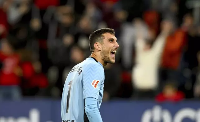 Osasuna's goalkeeper Sergio Herrera reacts during a Spanish La Liga soccer match between Osasuna and Barcelona at El Sadar stadium in Pamplona, Spain, Saturday, Sept. 28, 2024. (AP Photo/Miguel Oses)