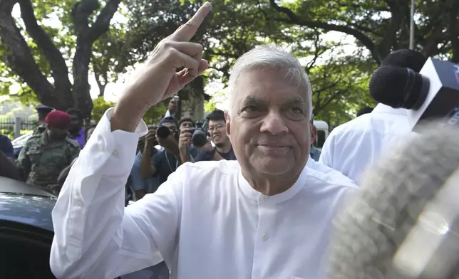 Sri Lankan president and independent presidential candidate Ranil Wickremesinghe reacts after casting his vote, in Colombo, Sri Lanka, Saturday, Sept. 21, 2024. (AP Photo/Rajesh Kumar Singh)