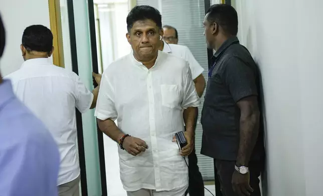 Opposition leader and the presidential candidate of United People's Power Sajith Premadasa arrives for an interview with The Associated Press in Colombo, Sri Lanka, Thursday, Sept. 12, 2024. (AP Photo/Eranga Jayawardena)