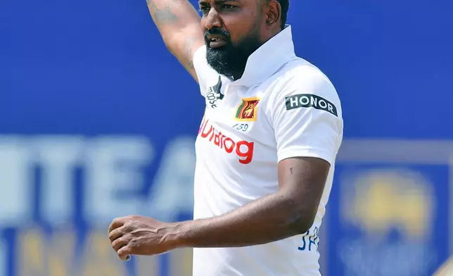 Sri Lanka's Prabath Jayasuriya celebrates the wicket of New Zealand's Tom Blundell on the third day of the first cricket test match between New Zealand and Sri Lanka in Galle, Sri Lanka, Friday, Sept. 20, 2024. (AP Photo/Viraj Kothalawala)