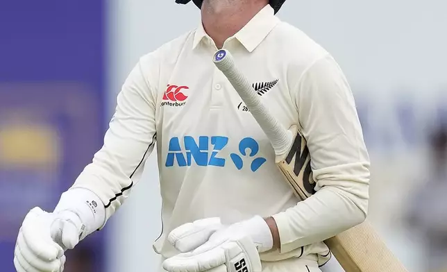 New Zealand's Devon Conway leaves the field after losing his wicket during the day two of the first test cricket match between Sri Lanka and New Zealand in Galle, Sri Lanka, Friday, Sept. 27, 2024. (AP Photo/Eranga Jayawardena)