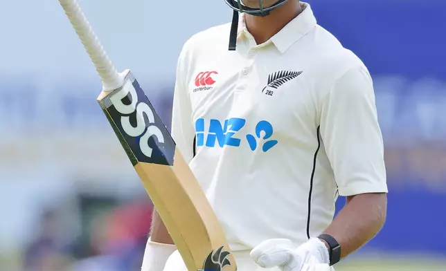 New Zealand's Rachin Ravindra reacts as he leaves the field after losing his wicket to Sri Lanka's Prabath Jayasuriya on the fifth and final day of the first cricket test match between New Zealand and Sri Lanka in Galle, Sri Lanka, Monday, Sept. 23, 2024. (AP Photo/Viraj Kothalawala)