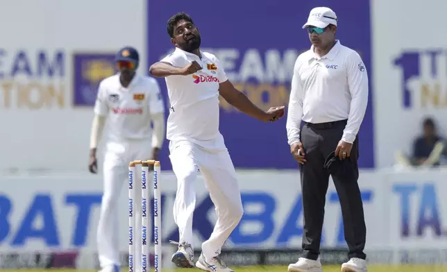 Sri Lanka's Prabath Jayasuriya bowls a delivery during the day three of the second test cricket match between Sri Lanka and New Zealand in Galle , Sri Lanka, Saturday, Sept. 28, 2024. (AP Photo/Eranga Jayawardena)