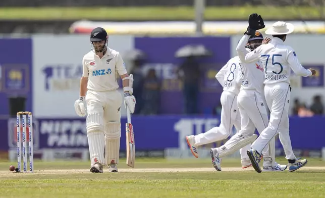 New Zealand's Kane Williamson leaves the field after losing his wicket during the day three of the second test cricket match between Sri Lanka and New Zealand in Galle , Sri Lanka, Saturday, Sept. 28, 2024. (AP Photo/Eranga Jayawardena)