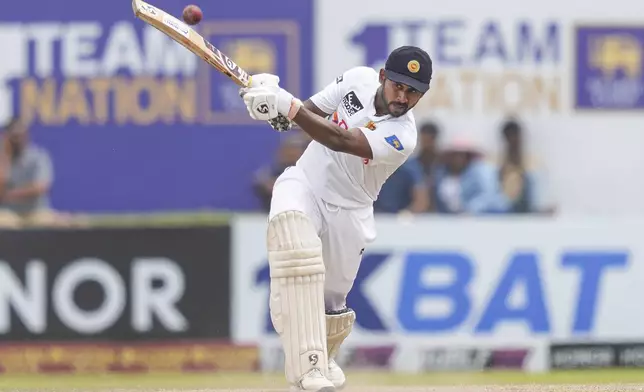 Sri Lanka's Kamindu Mendis plays a shot during the day two of the first test cricket match between Sri Lanka and New Zealand in Galle, Sri Lanka, Friday, Sept. 27, 2024. (AP Photo/Eranga Jayawardena)