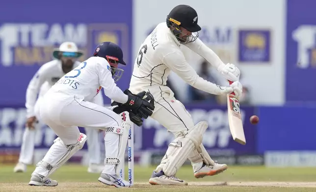 New Zealand's Tom Blundell plays a shot during the day four of the second test cricket match between Sri Lanka and New Zealand in Galle, Sri Lanka, Sunday, Sept. 29, 2024. (AP Photo/Eranga Jayawardena)