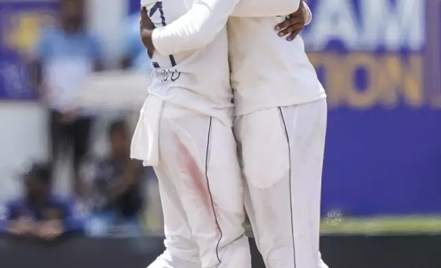 Sri Lanka's Nishan Peiris celebrates the wicket of New Zealand's Glenn Phillips during the day four of the second test cricket match between Sri Lanka and New Zealand in Galle, Sri Lanka, Sunday, Sept. 29, 2024. (AP Photo/Eranga Jayawardena)