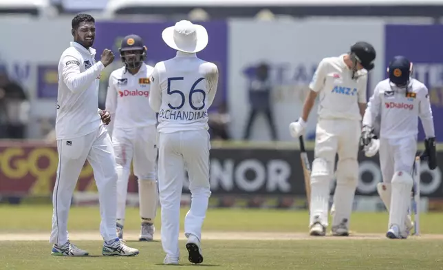 Sri Lanka's Nishan Peiris celebrates the wicket ofNew Zealand's Mitchell Santner during the day three of the second test cricket match between Sri Lanka and New Zealand in Galle , Sri Lanka, Saturday, Sept. 28, 2024. (AP Photo/Eranga Jayawardena)