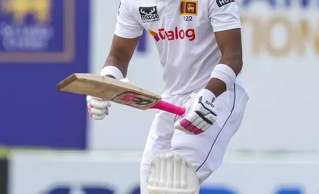 Sri Lanka's Dinesh Chandimal watches his shot during the day one of the first test cricket match between Sri Lanka and New Zealand in Galle , Sri Lanka, Thursday, Sept. 26, 2024. (AP Photo/Eranga Jayawardena)